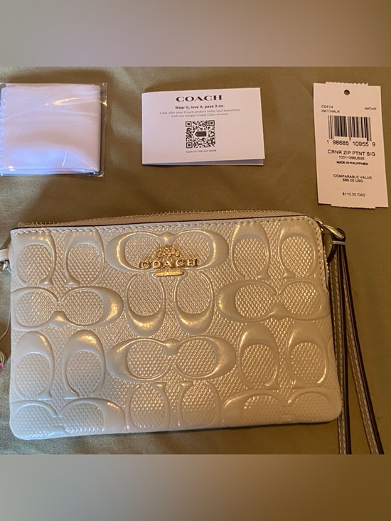 Coach Handbags - Coach Cream Patent Signature Wristlet with Gold Hardware